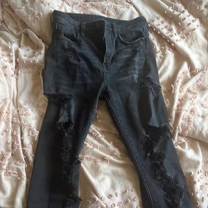 black ripped American eagle skinny jeans